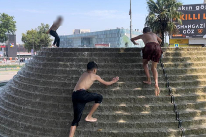 Sıcaklardan bunalan çocukların tehlikeli oyunu