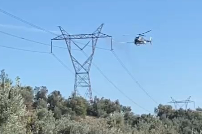 Yüksek gerilim hatları helikopterle temizlendi